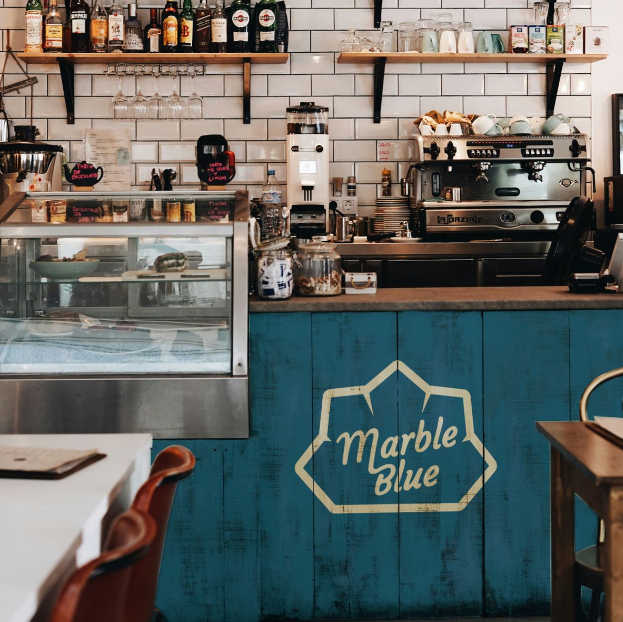 brand logo on the counter in a cafe